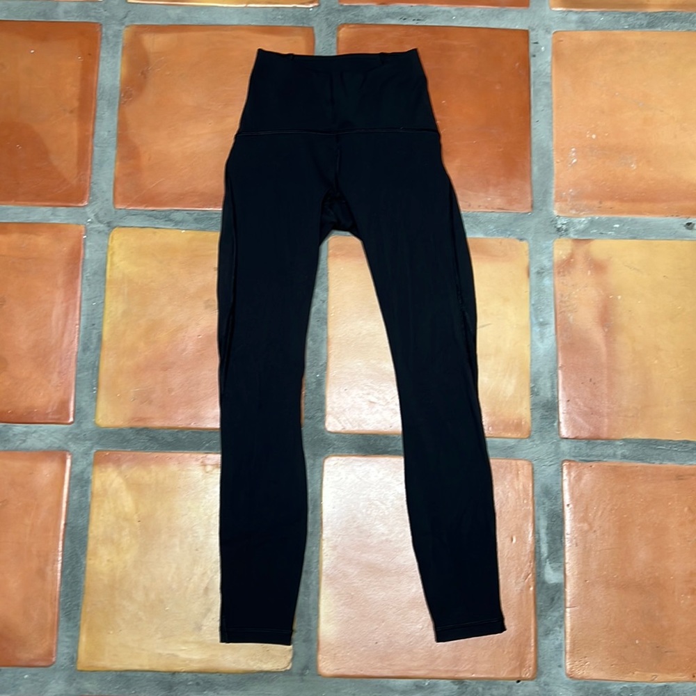 Lululemon 25 inch black leggings with mesh at bottom